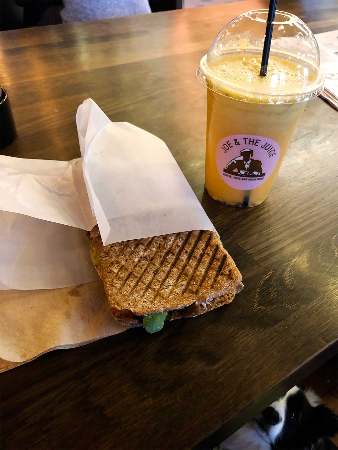 Sandwich and a fresh juice snack at Joe and The Juice at the Stockmann shopping center in Helsinki, Finland.