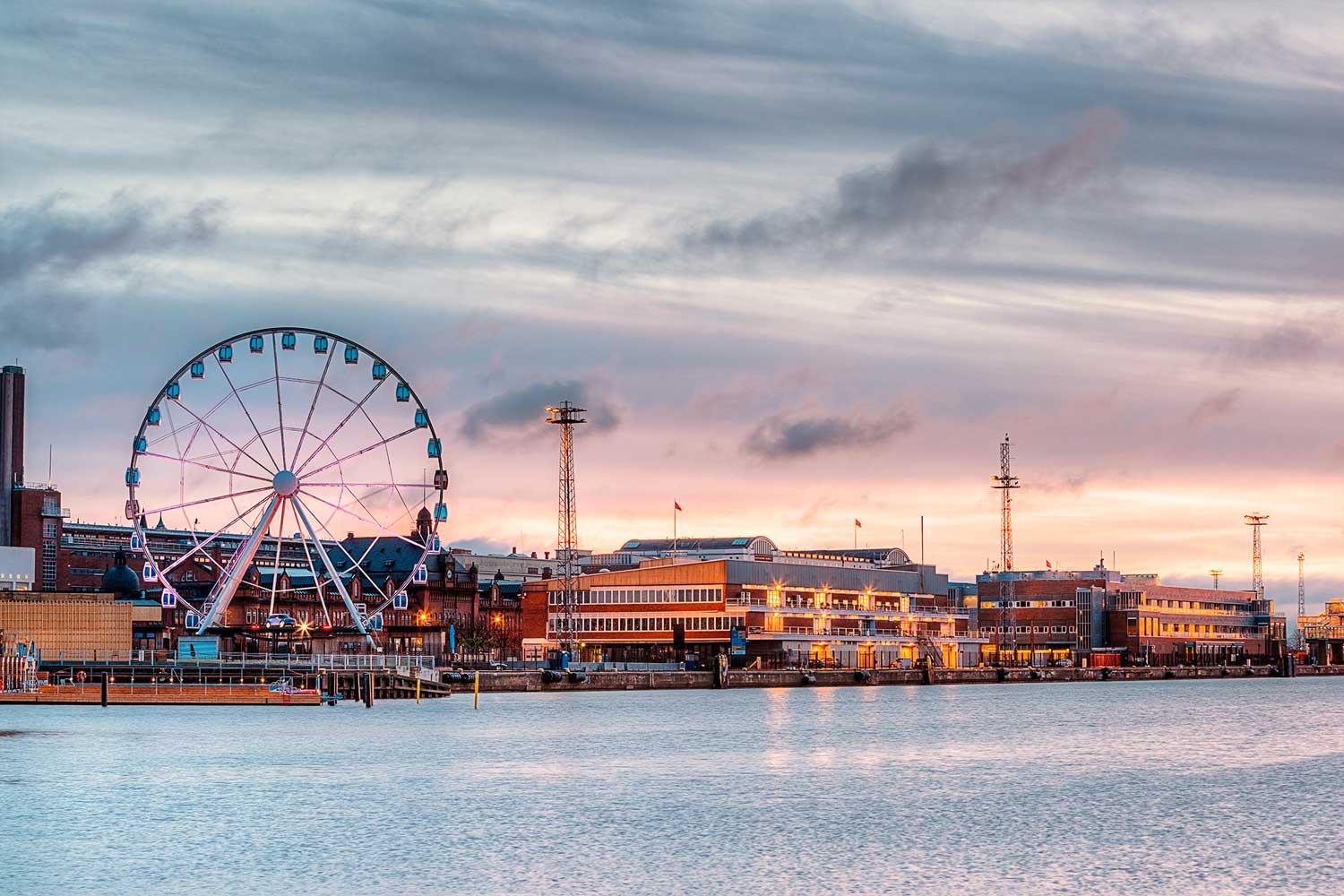 View of the Ferris wheel near the river in Helsinki, Finland.