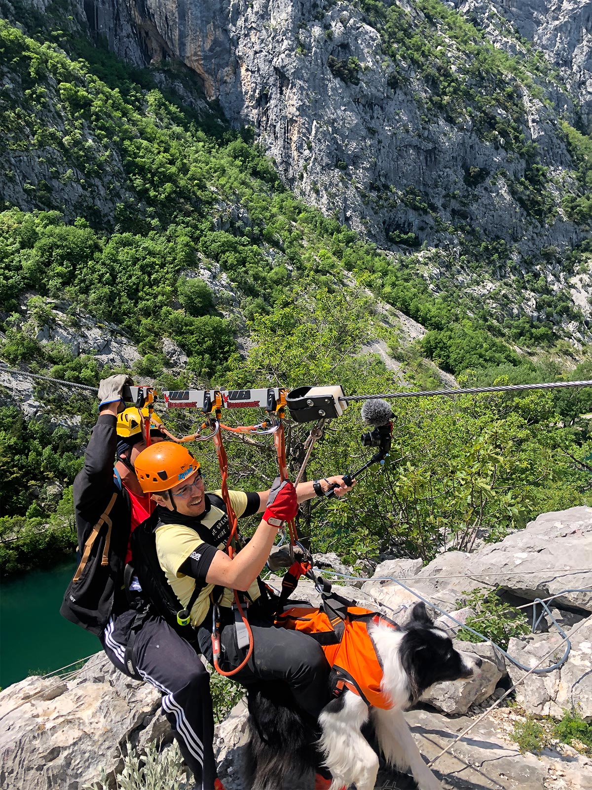 Pedro and Rafa zip lining with the instructor.